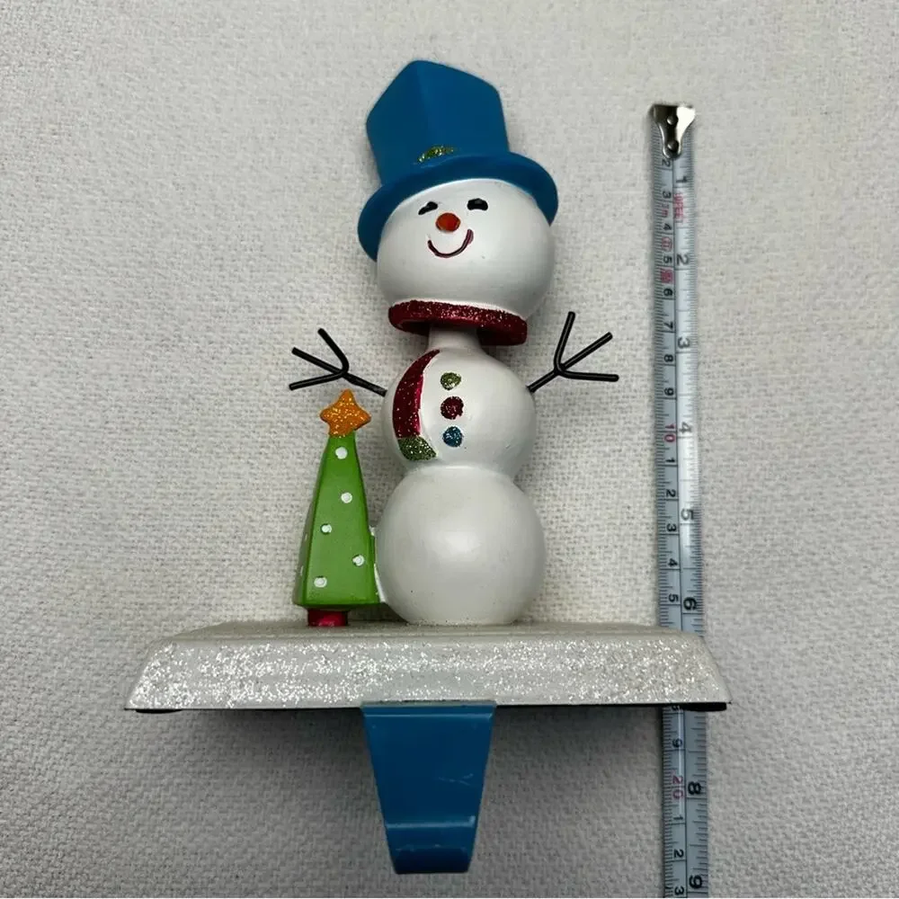 Snowman bobble head stocking holder